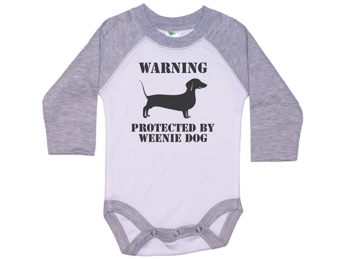 Warning Protected By A Weenie Dog Onesie®