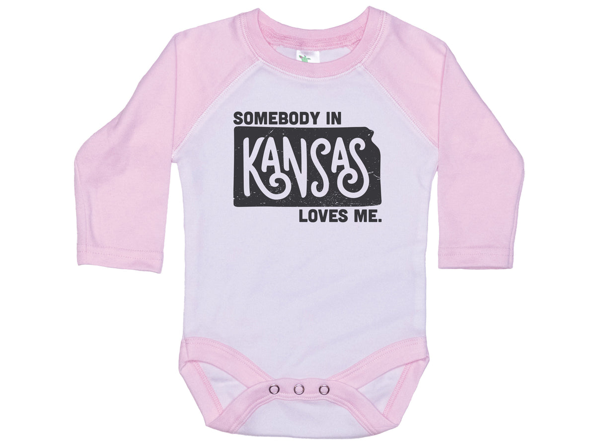 Somebody In Kansas Loves Me Onesie®
