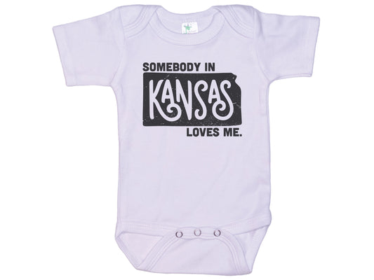 Somebody In Kansas Loves Me Onesie®