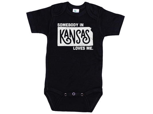 Somebody In Kansas Loves Me Onesie®