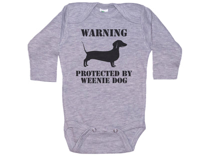 Warning Protected By A Weenie Dog Onesie®