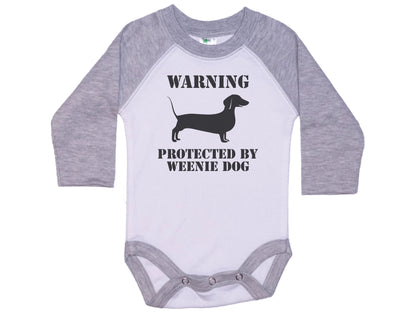 Warning Protected By A Weenie Dog Onesie®