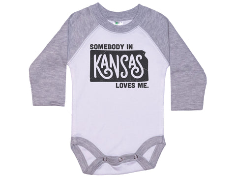 Somebody In Kansas Loves Me Onesie®
