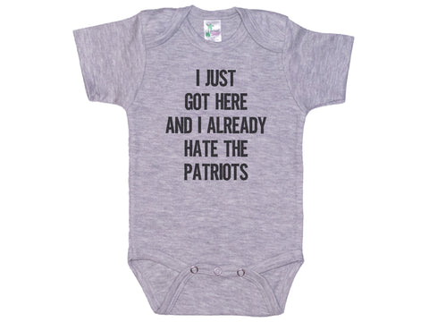 I Just Got Here And I Already Hate The Patriots Onesie®