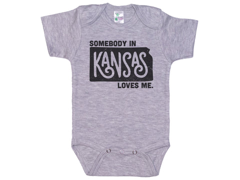 Somebody In Kansas Loves Me Onesie®