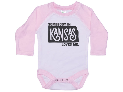 Somebody In Kansas Loves Me Onesie®