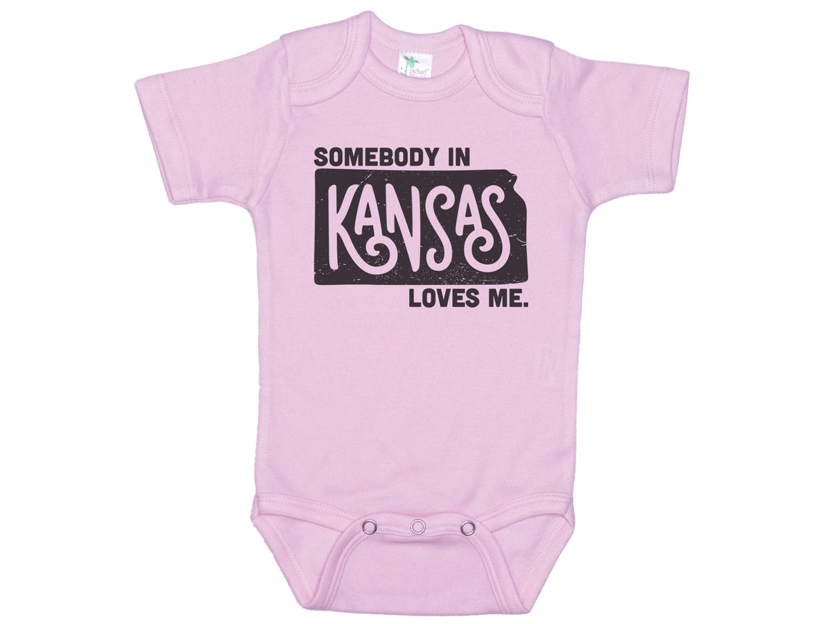 Somebody In Kansas Loves Me Onesie®