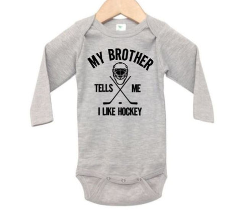 My Brother Tells Me I Like Hockey Baby Onesie