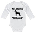Warning Protected By A Doberman Baby Onesie